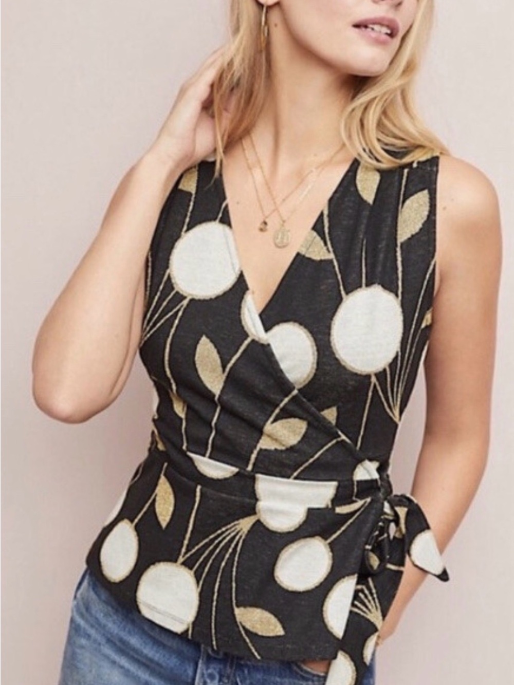 Anthropologie Black Sleeveless Wrap Top with White Circles and Gold Leaf Accents